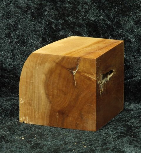 Base with sloping front