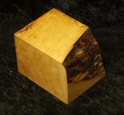 Base with black grain and natural edge