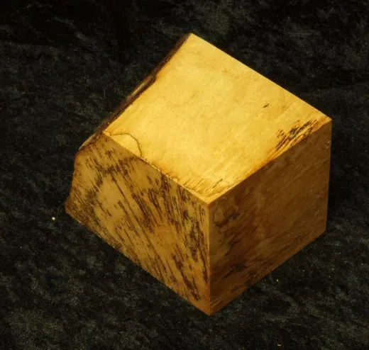 Base with black grain and natural edge