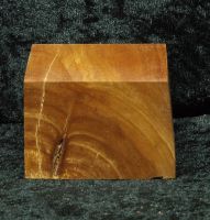 Base with sloping front